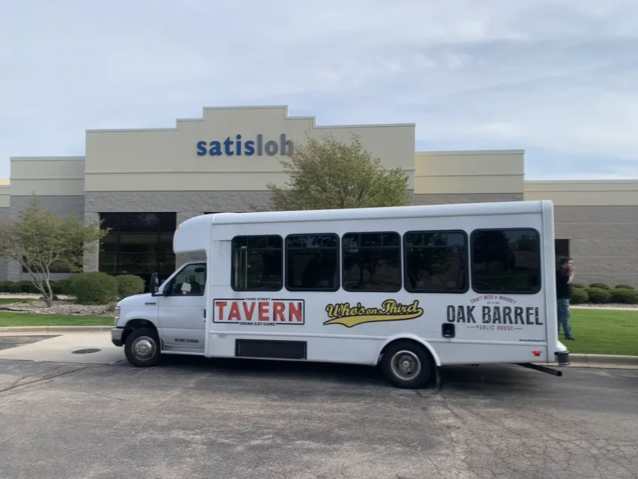The shuttle bus outside an office building in Germantown